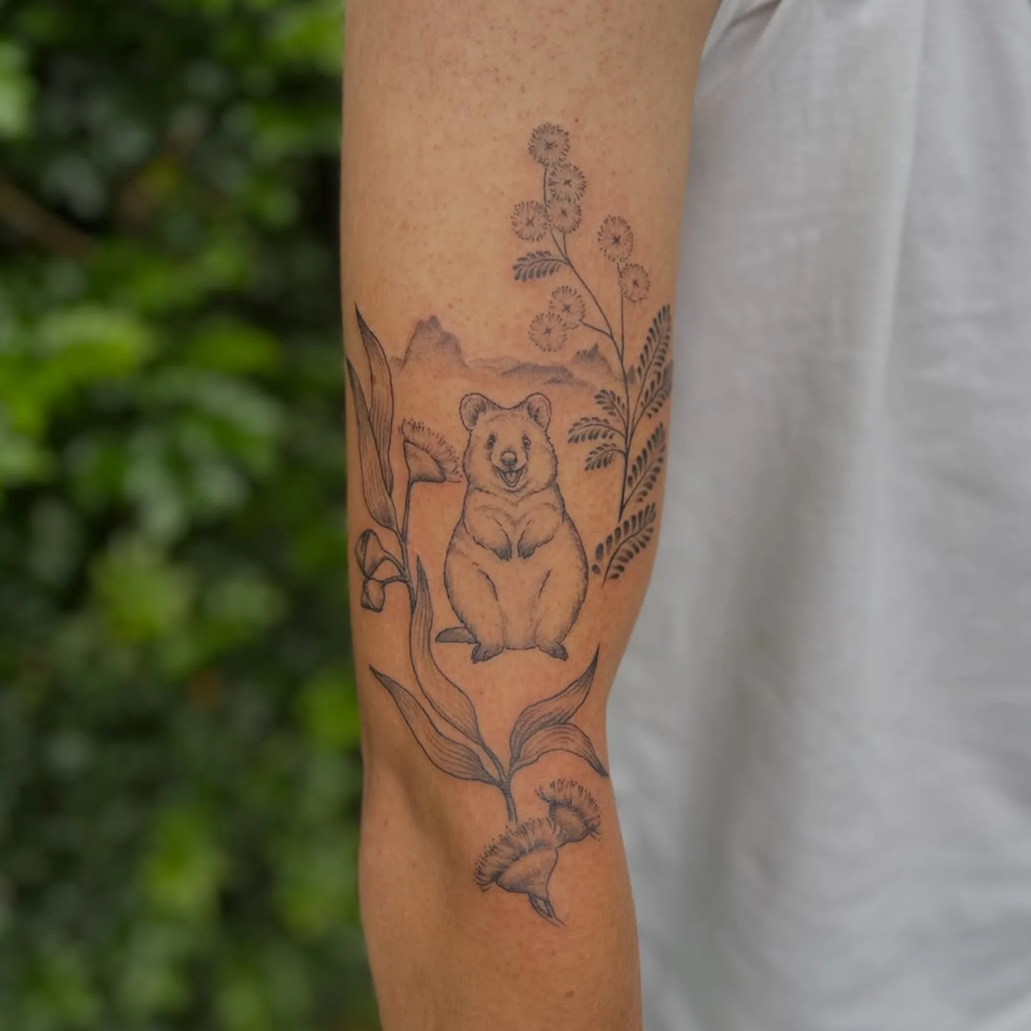 detailed australian-themed tattoo